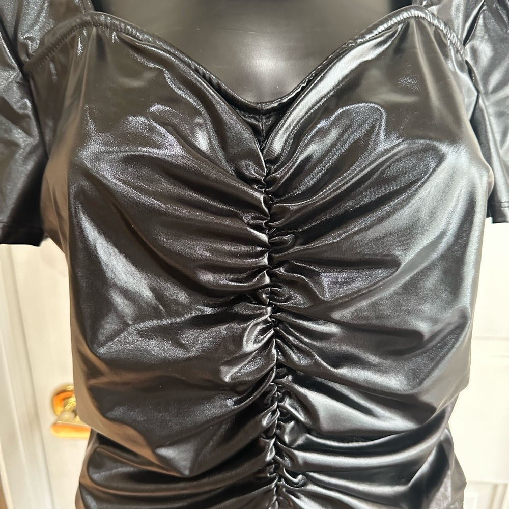 Black pleather cropped top.
